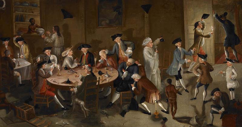 Mens sitting on chairs with round table