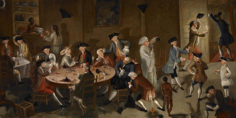Mens sitting on chairs with round table