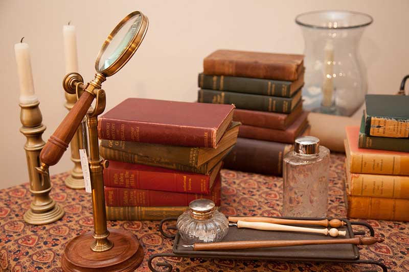 Books and candles on the table