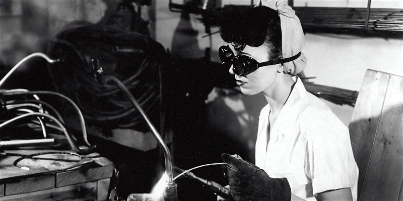 Lady wearing protection goggle and working