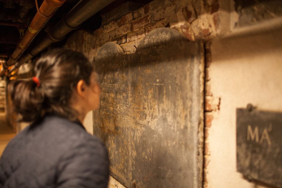 A woman touring the Old North Crypt.