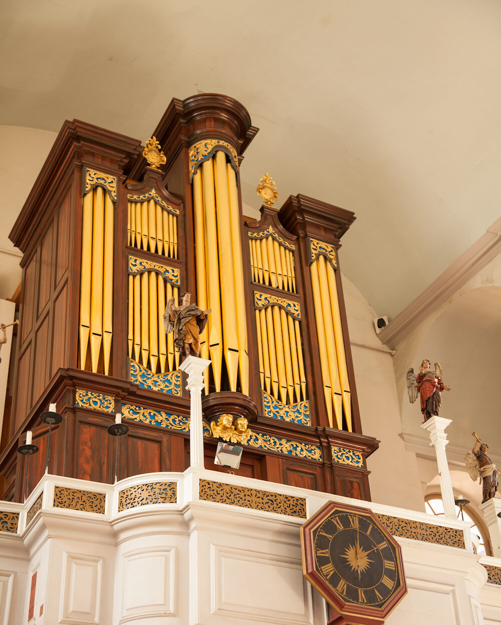 The pipe organ and carved angels in the gallery of the Old North Church.